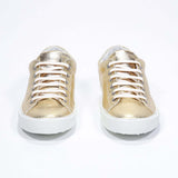 Women's Low-top PURE sneaker in Metallic Gold Leather - the perfect sneakers to elevate any outfit.