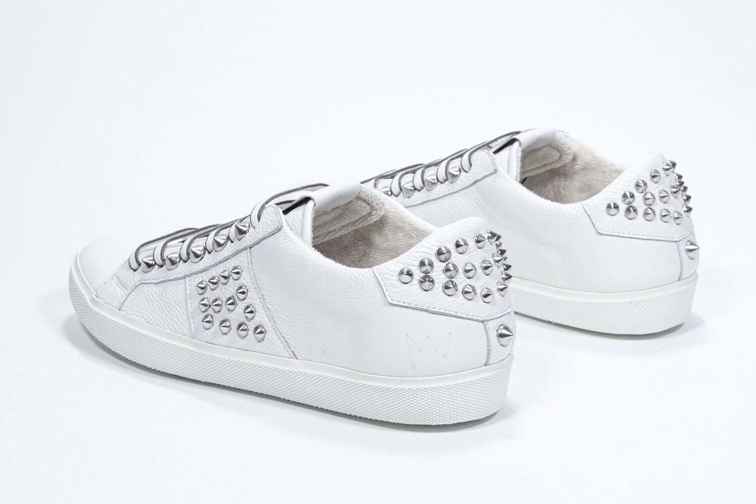  Women's Low-top STUDLIGHT in White Leather and Silver Studs sneakers, showcasing a sleek design and handcrafted details.