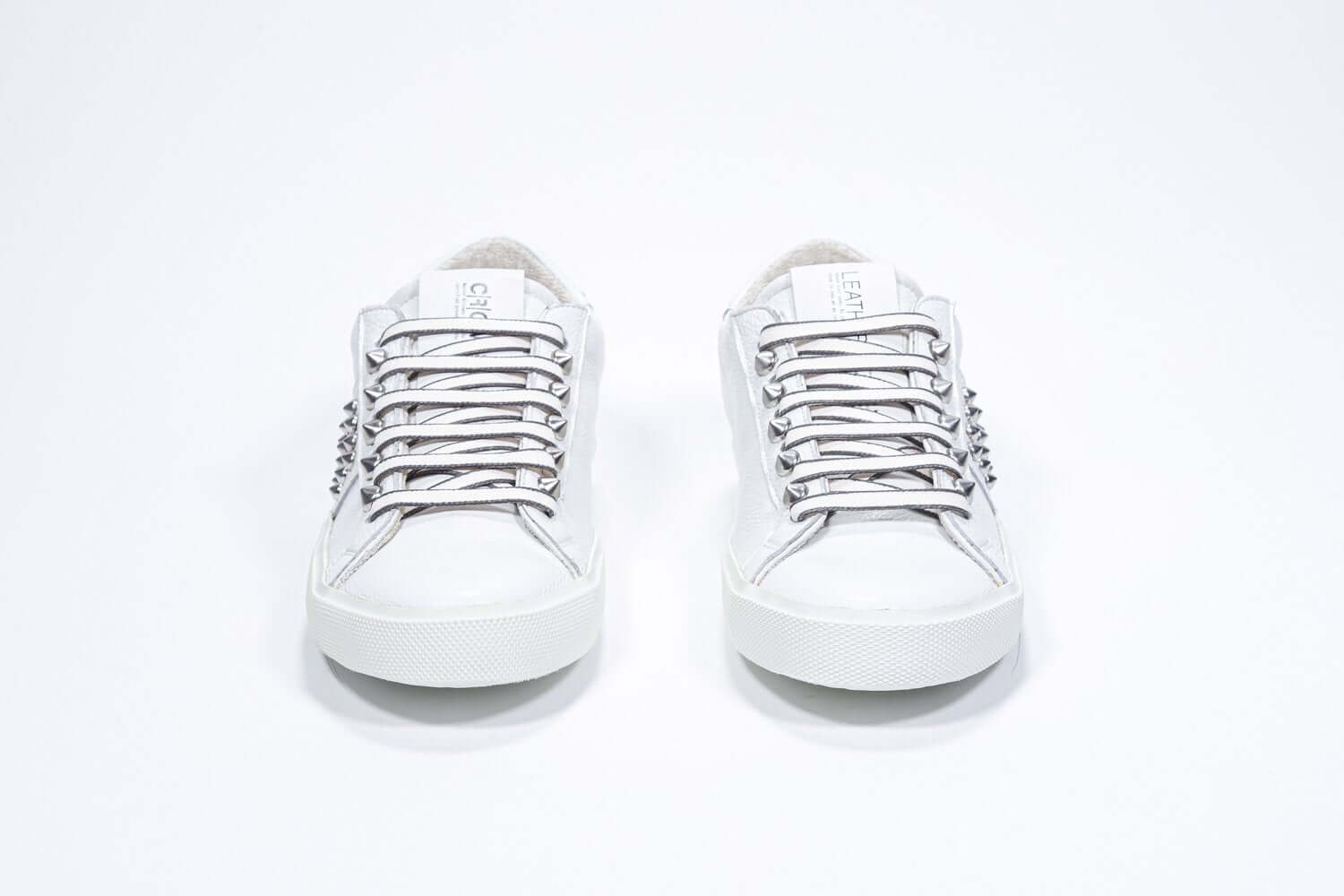  Women's Low-top STUDLIGHT in White Leather and Silver Studs sneakers, from the front view.